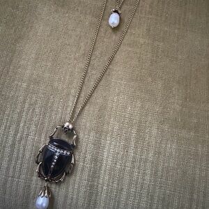 Elegant Black and Gold Scarab Necklace